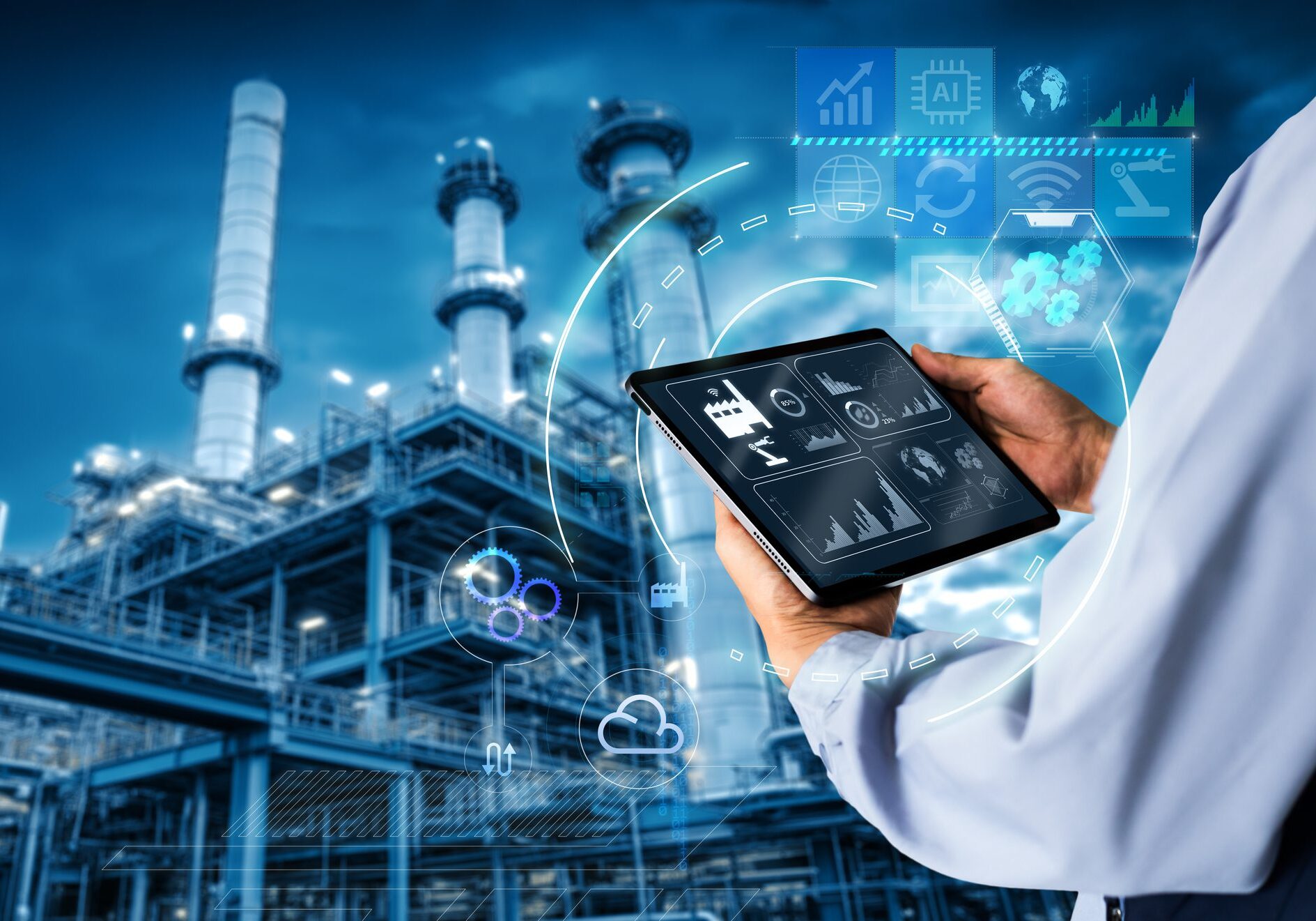 Hands holding tablet on blurred Chemical plant refinery industrial equipment as background